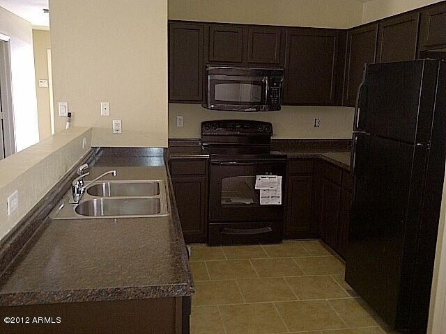 Property Photo: 11954 W Berkeley Road AZ 85392