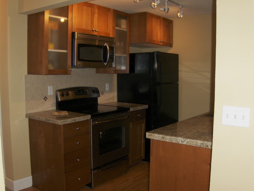 Property Photo:  300 N 130th St 6201  WA 98133 