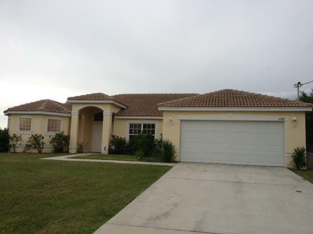 Property Photo: 1289 SW Idol Avenue FL 34953
