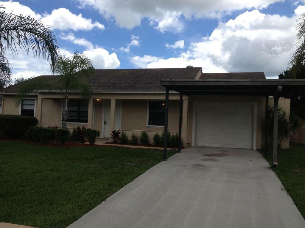 Property Photo:  2437 SE Marius Street  FL 34953 