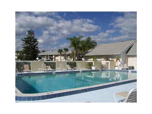 Property Photo:  1530 SE Royal Green Circle 203  FL 34952 