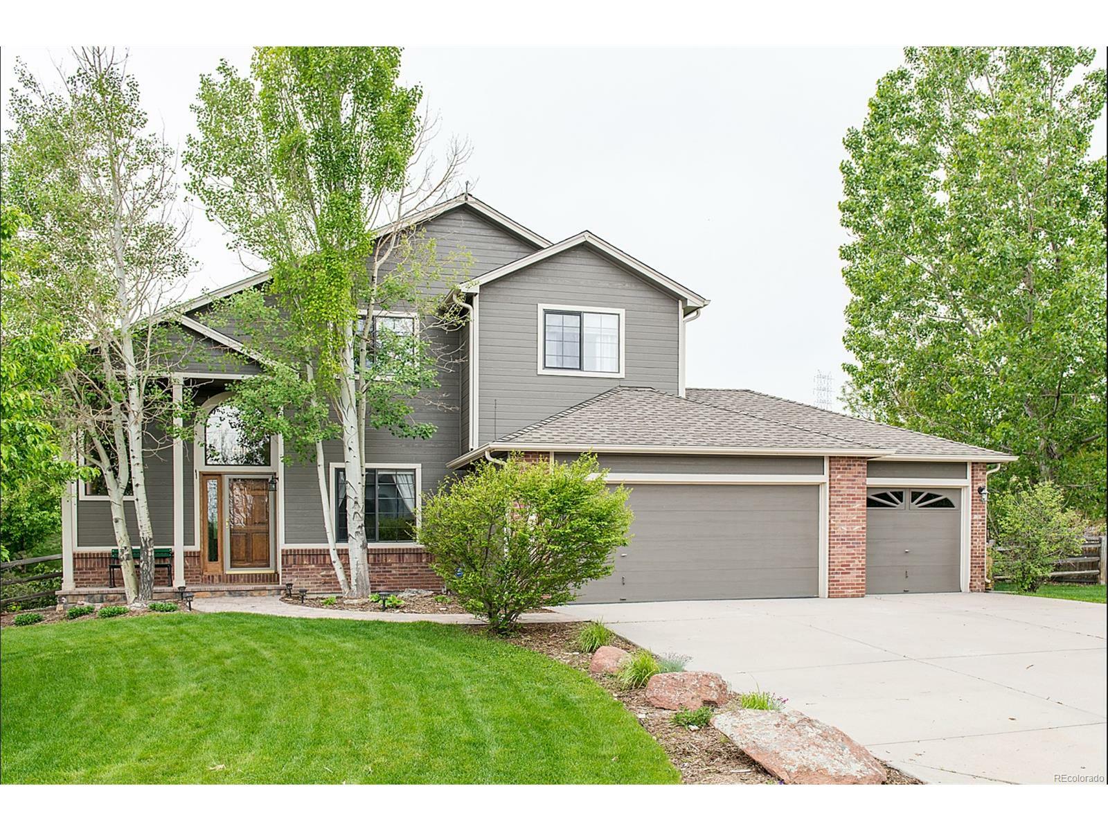 Property Photo: 17630 West 58th Drive CO 80403