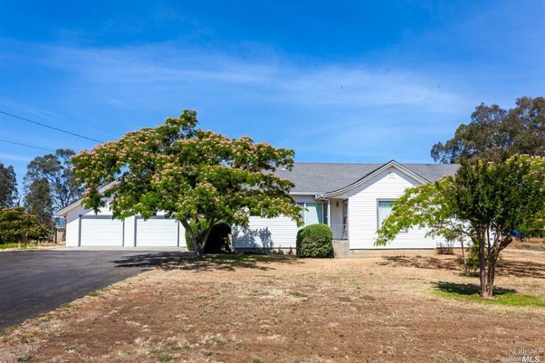 Property Photo:  7615 Paddon Road  CA 95688 