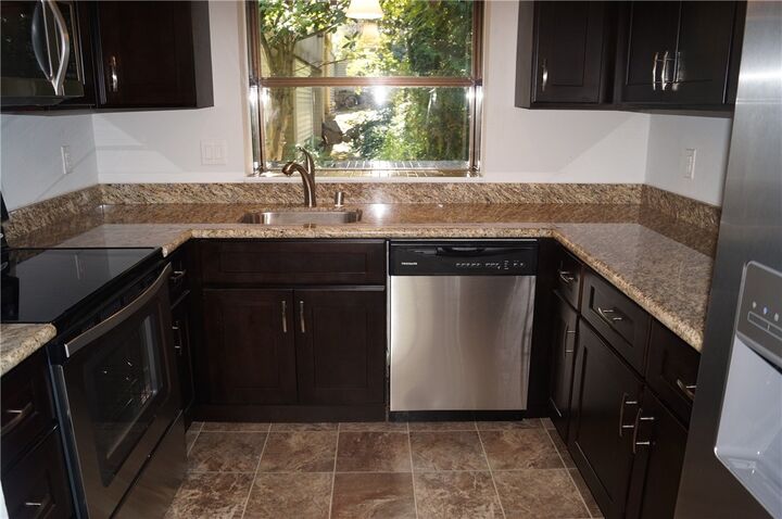Property Photo:  15625  42nd Avenue S E-24  WA 98188 