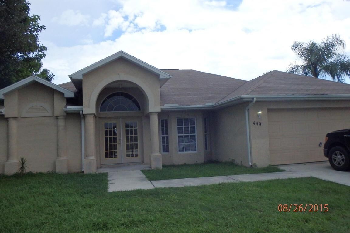 Property Photo:  449 NE Airoso Boulevard  FL 34983 