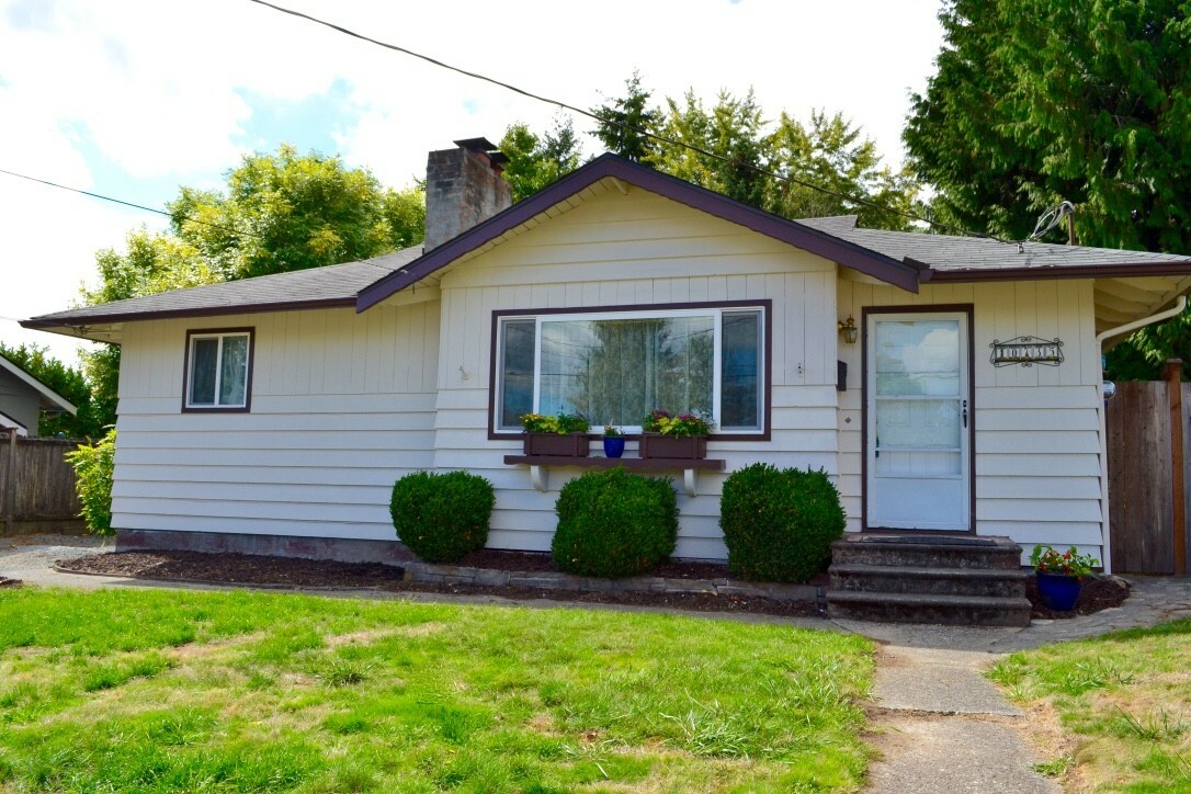 Property Photo:  10735 63rd Ave S  WA 98178 