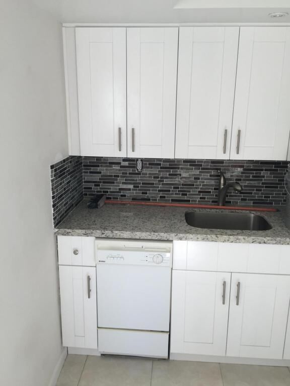 Property Photo:  641 Normandy N  FL 33484 