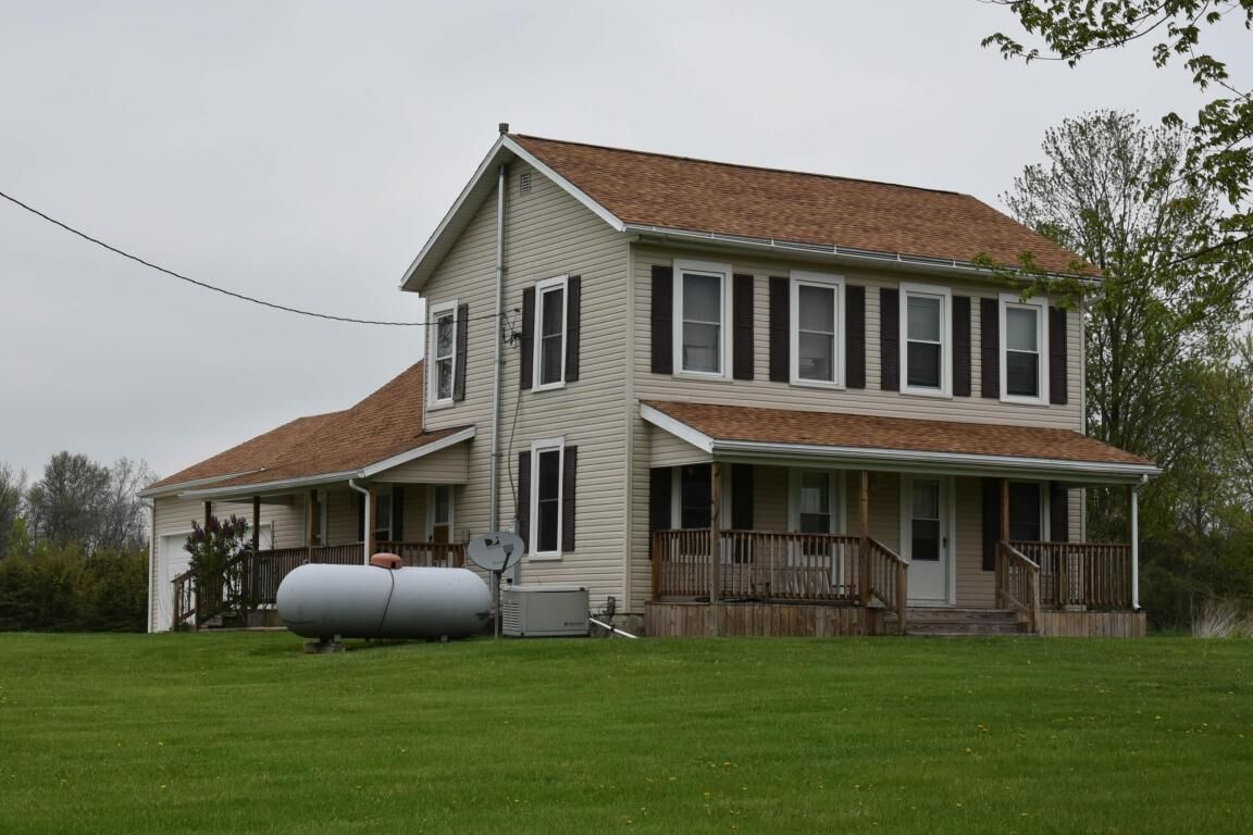 Property Photo:  2105 County Road 63  OH 43320 