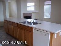 Property Photo:  9409 W Elm Street  AZ 85037 