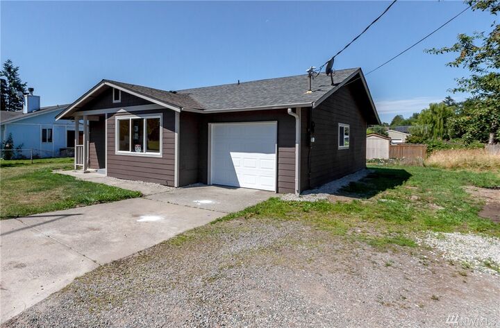Property Photo: 5212 E Portland Avenue WA 98404