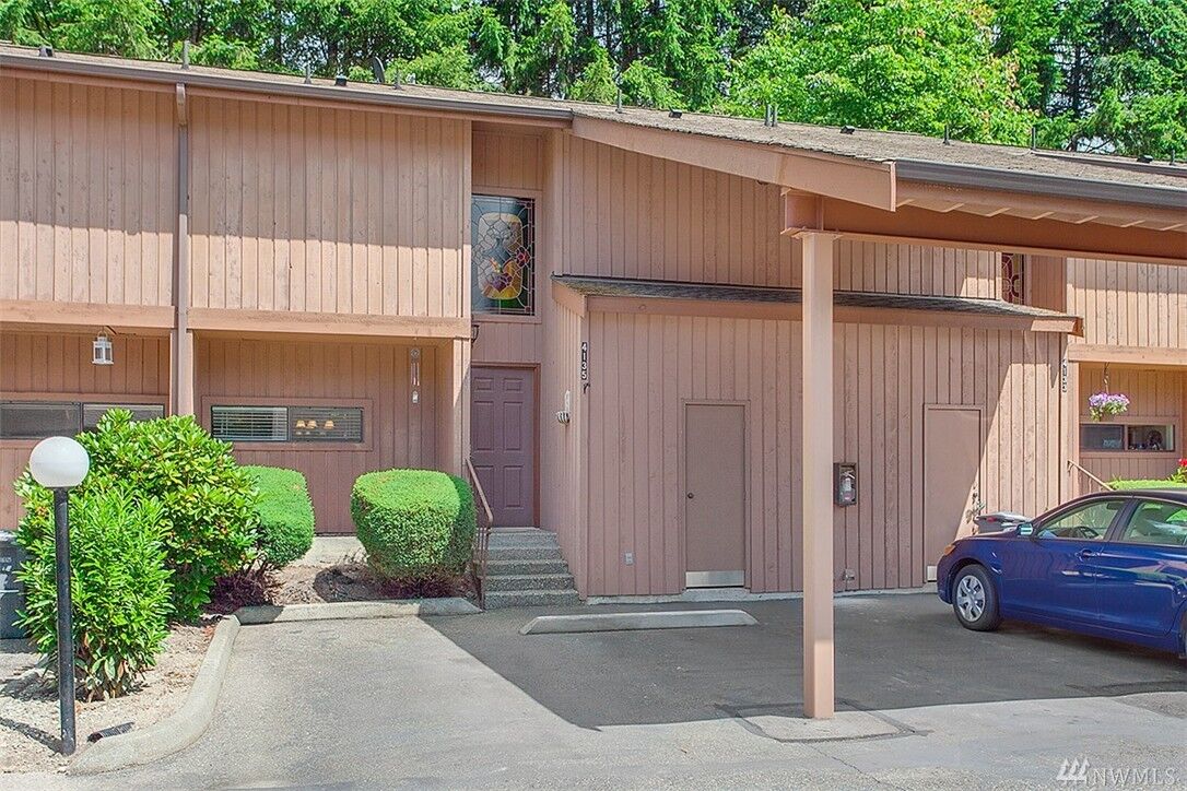 Property Photo:  4135 145th Avenue NE E4  WA 98007 