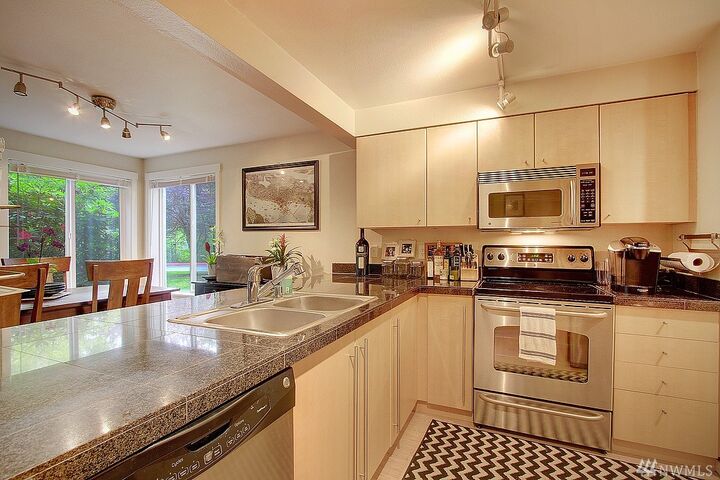 Property Photo:  11311 NE 128th Street D103  WA 98034 