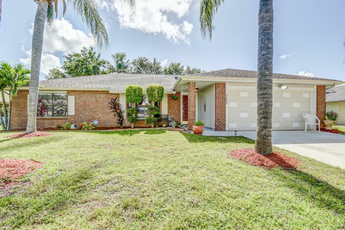 Property Photo:  2493 SW Hinchman Street  FL 34984 