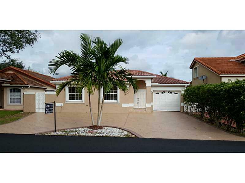 Property Photo: 8323 NW 201 St FL 33015