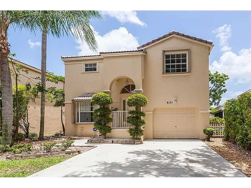 Property Photo:  651 NW 88 Dr  FL 33071 