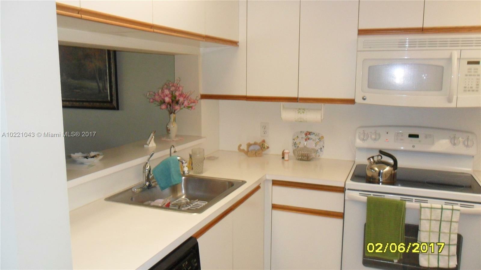 Property Photo:  13001 SW 15th Ct T202  FL 33027 