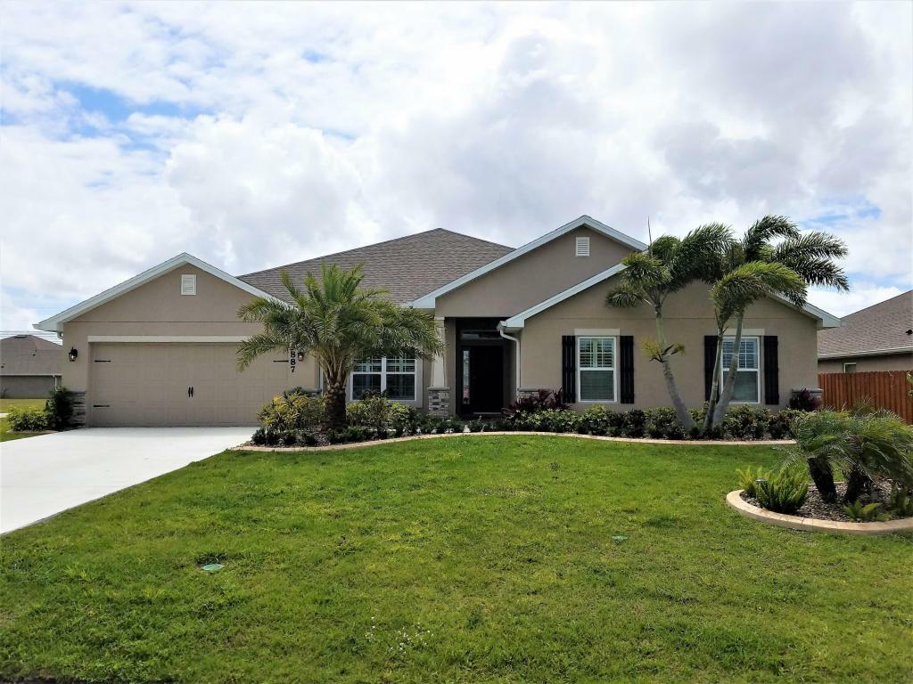 Property Photo:  5887 NW Leah Drive  FL 34986 