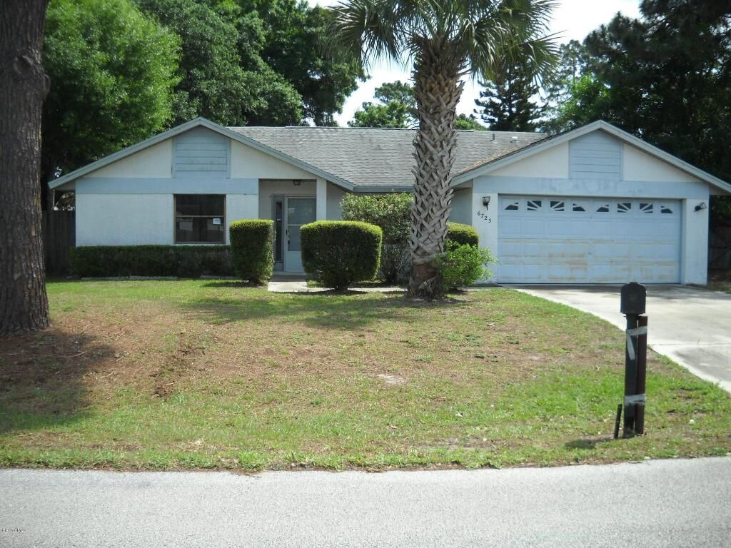 Property Photo:  6725 Alazan Avenue  FL 32927 