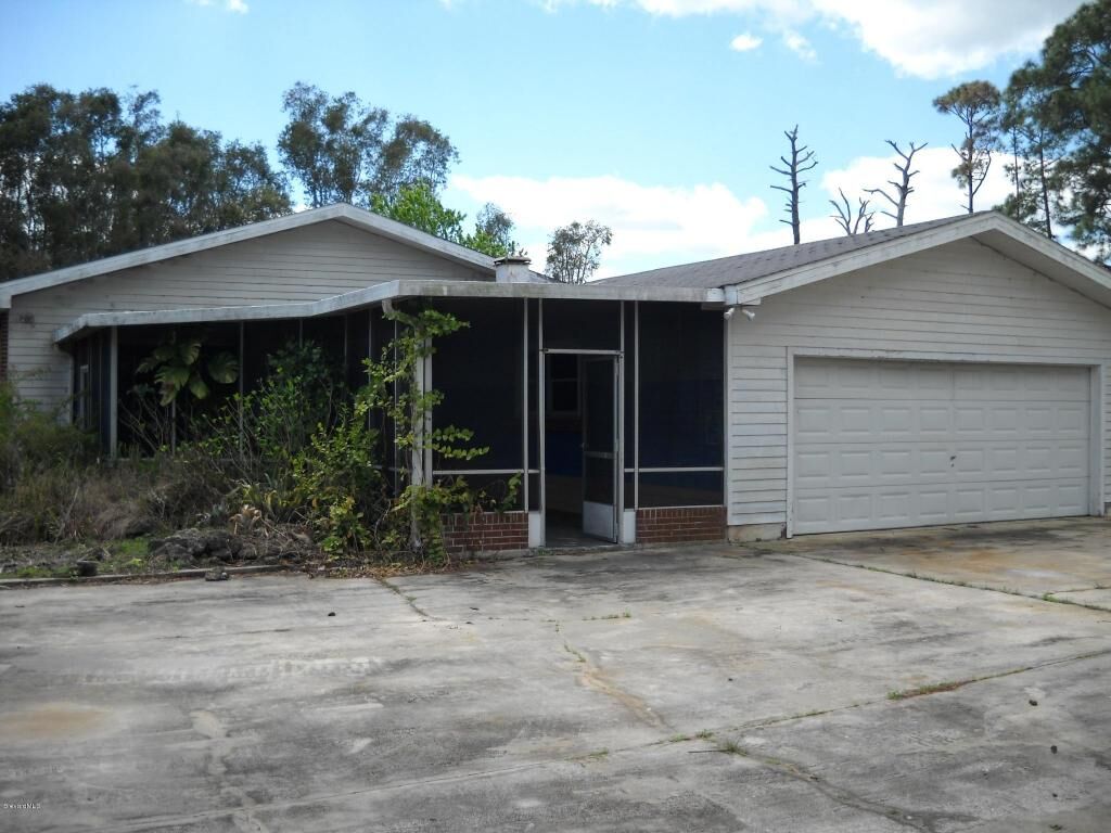 Property Photo:  4840 State Road 524  FL 32926 