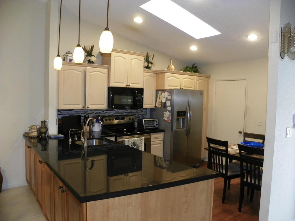 Property Photo:  10666 Beach Palm Court A  FL 33437 