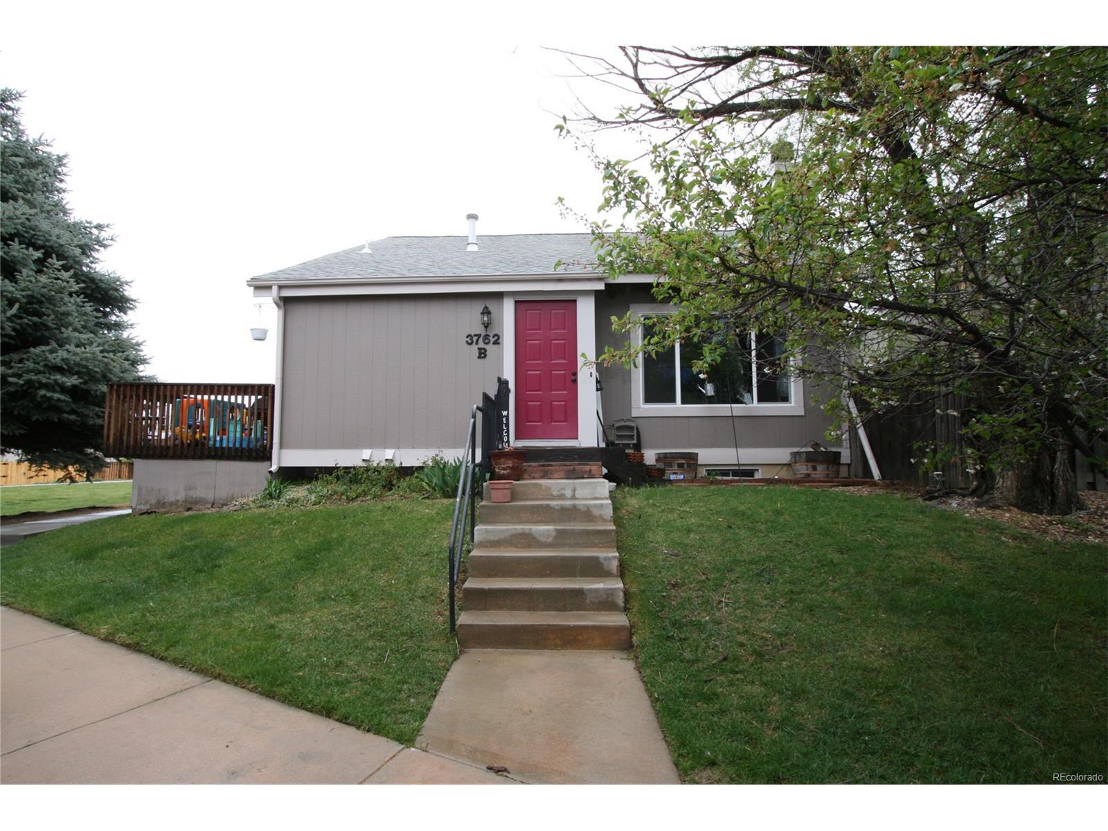Property Photo: 3762 South Genoa Circle Unit B CO 80013