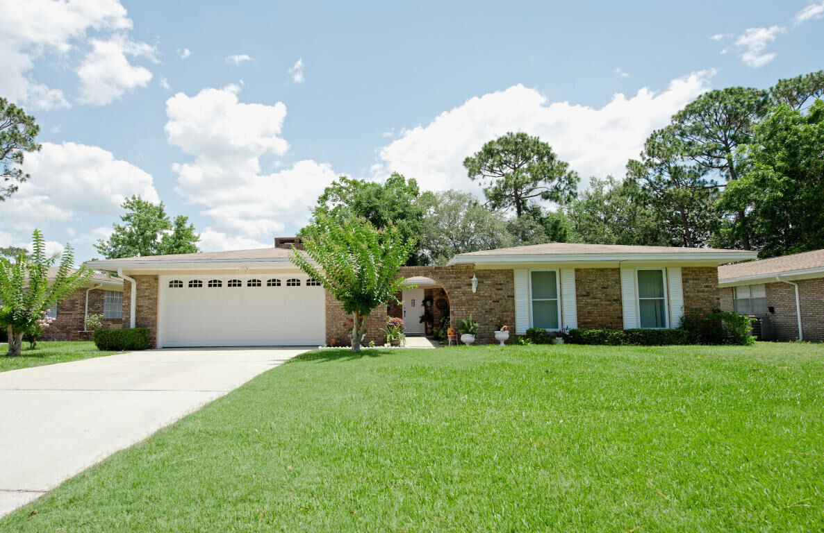 Property Photo:  1613 Date Palm Drive  FL 32578 