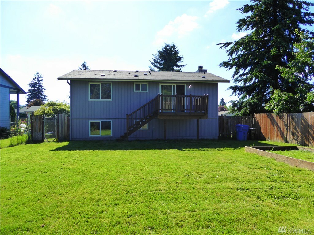 Property Photo:  9411 S J St  WA 98444 