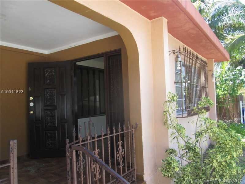 Property Photo:  1860 NW 33rd Ave  FL 33125 
