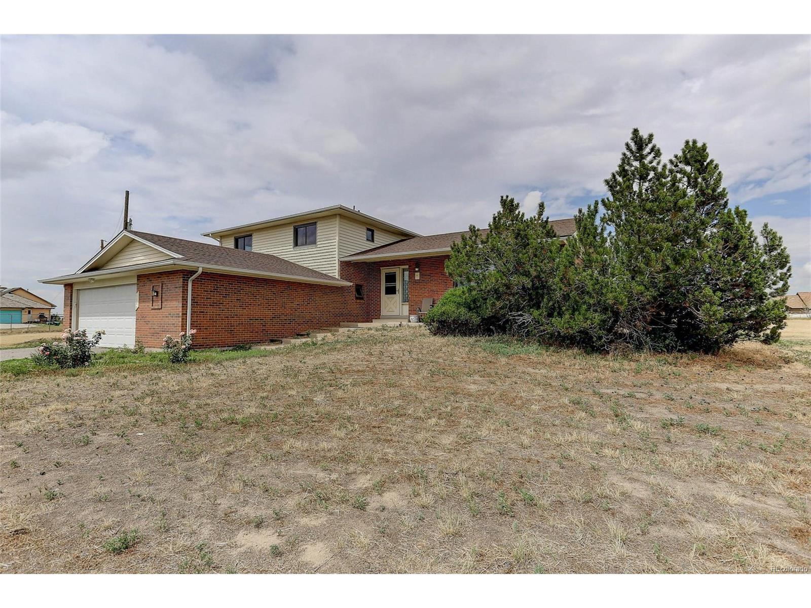 Property Photo: 1040 South Buchanan Street CO 80018