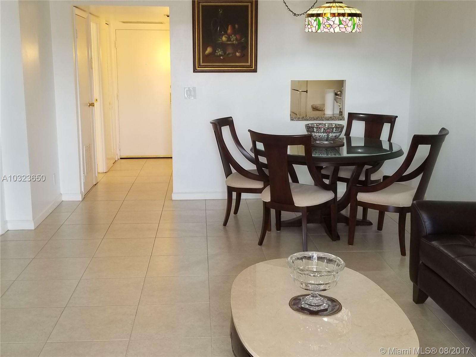 Property Photo:  20500 W Country Club Dr 703  FL 33180 