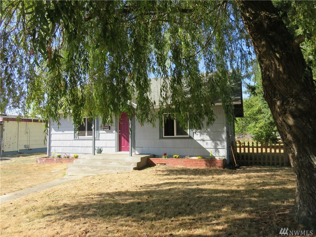 Property Photo:  1023 E 60th St  WA 98404 