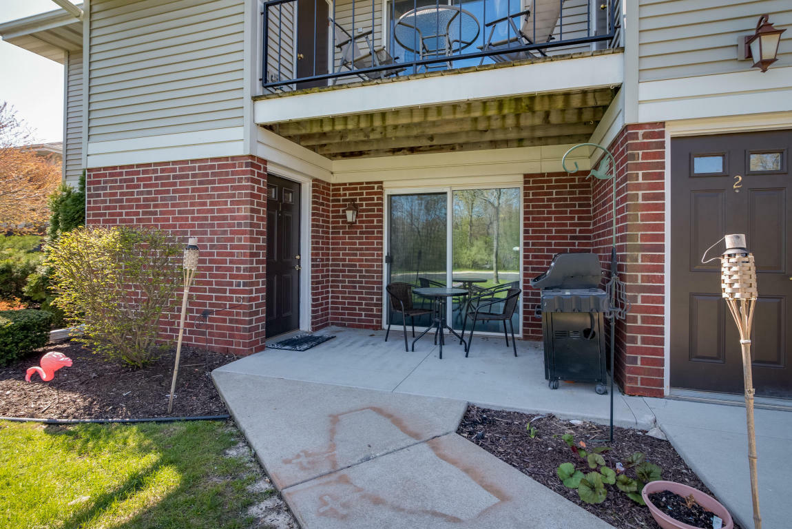 Property Photo:  N110w16973 Ashbury Cir 1  WI 53022 