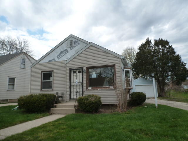 Property Photo:  6320 W Luscher Ave  WI 53218 