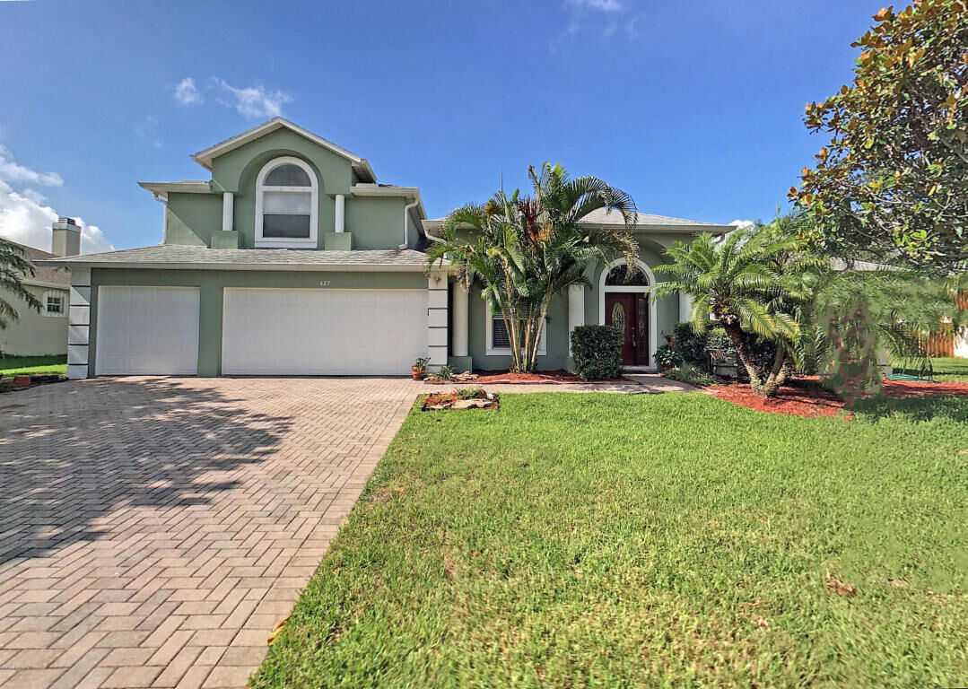 Property Photo: 423 Coastal Breeze Way FL 32953