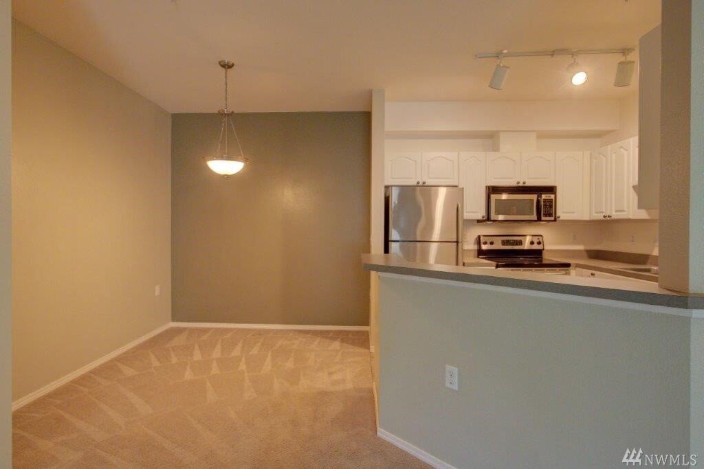 Property Photo:  801 Rainier Ave N F232  WA 98055 