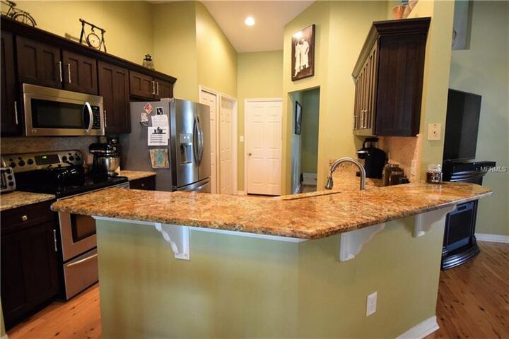 Property Photo:  12925 Brown Bark Trail  FL 34711 