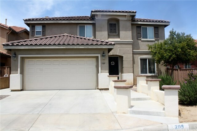 Property Photo:  209 La Amistad Way  CA 92545 