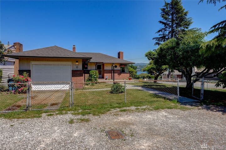 Property Photo:  11024 Forest Ave S  WA 98178 