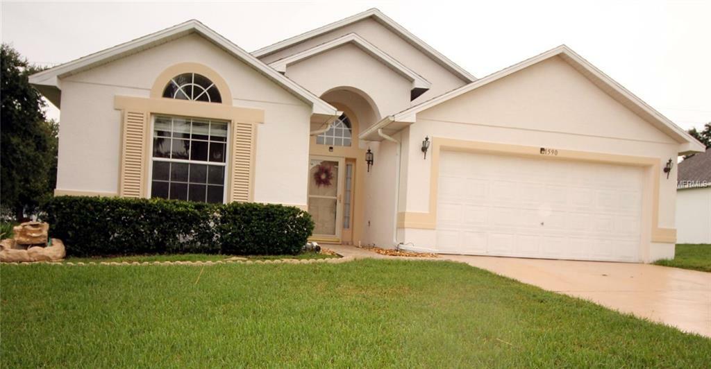 Property Photo:  1590 Silhouette Drive  FL 34711 