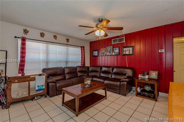 Property Photo:  209 SW 2nd Pl  FL 33004 