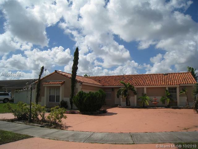 Property Photo:  20162 NW 58th Ct  FL 33015 