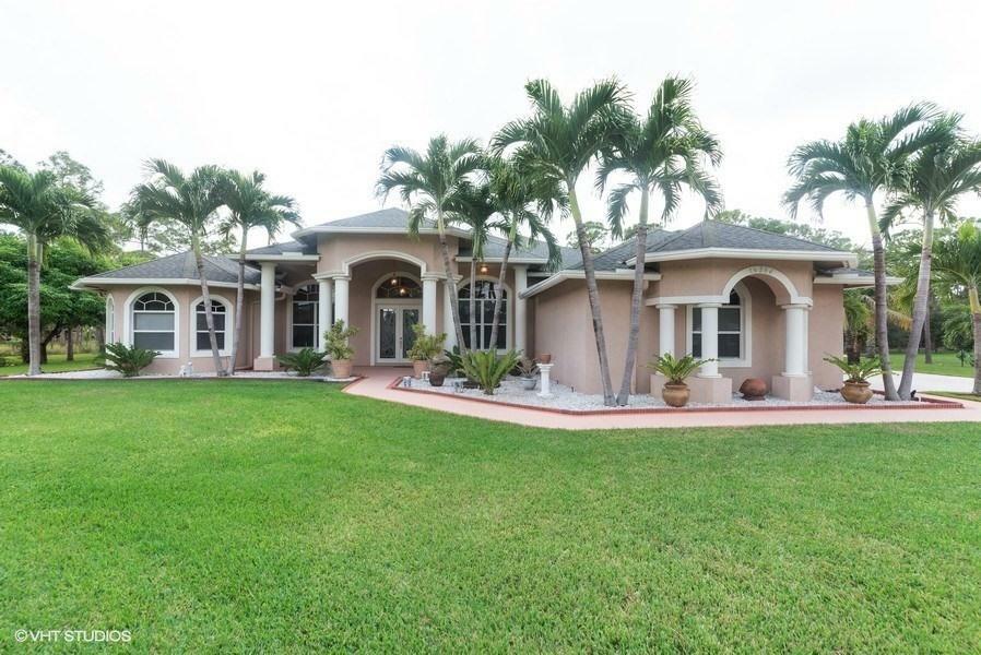 Property Photo: 16264 Hamlin Boulevard FL 33470