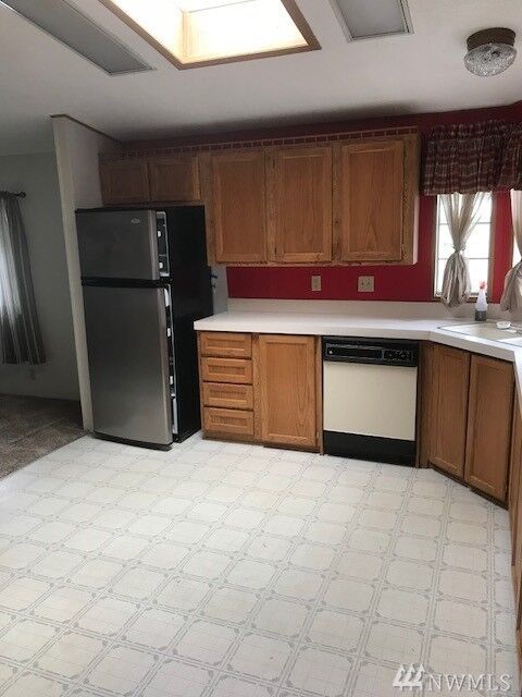 Property Photo:  8430 15th Place SE 66  WA 98258 