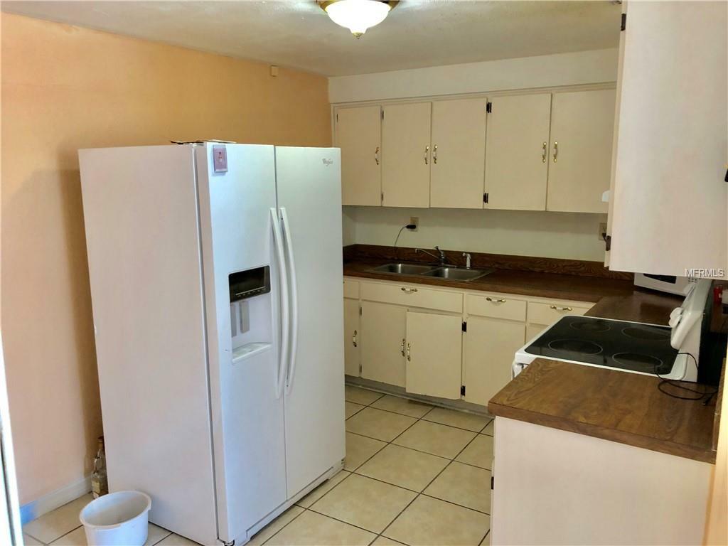 Property Photo:  6019 W Hanna Avenue  FL 33634 