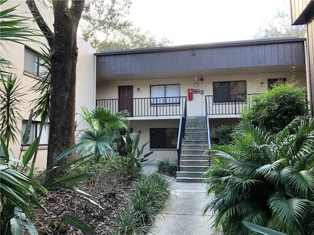 Property Photo:  11710 Raintree Village Boulevard A  FL 33617 