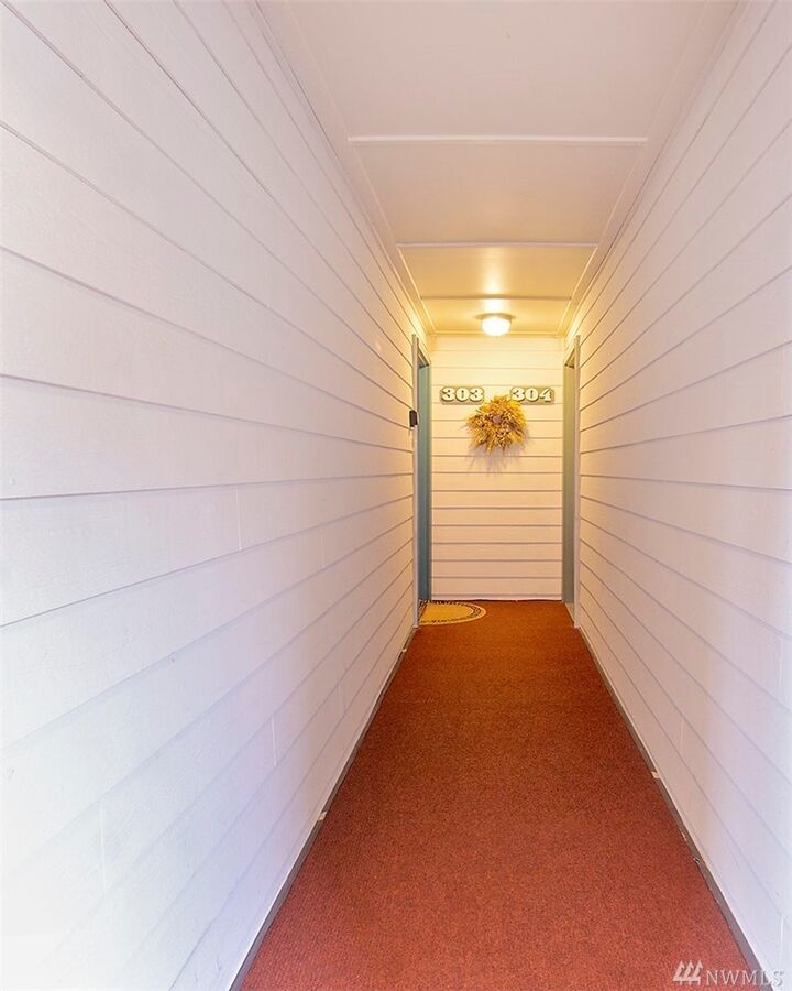 Property Photo:  900 East Bay Dr NE A303  WA 98506 