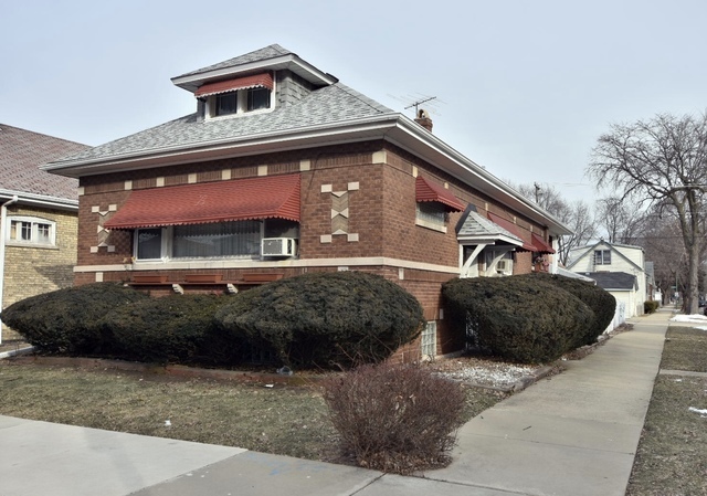 Property Photo:  5900 West Warwick Avenue  IL 60634 