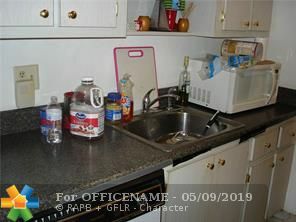 Property Photo:  7400 NW 4th Pl 104  FL 33063 