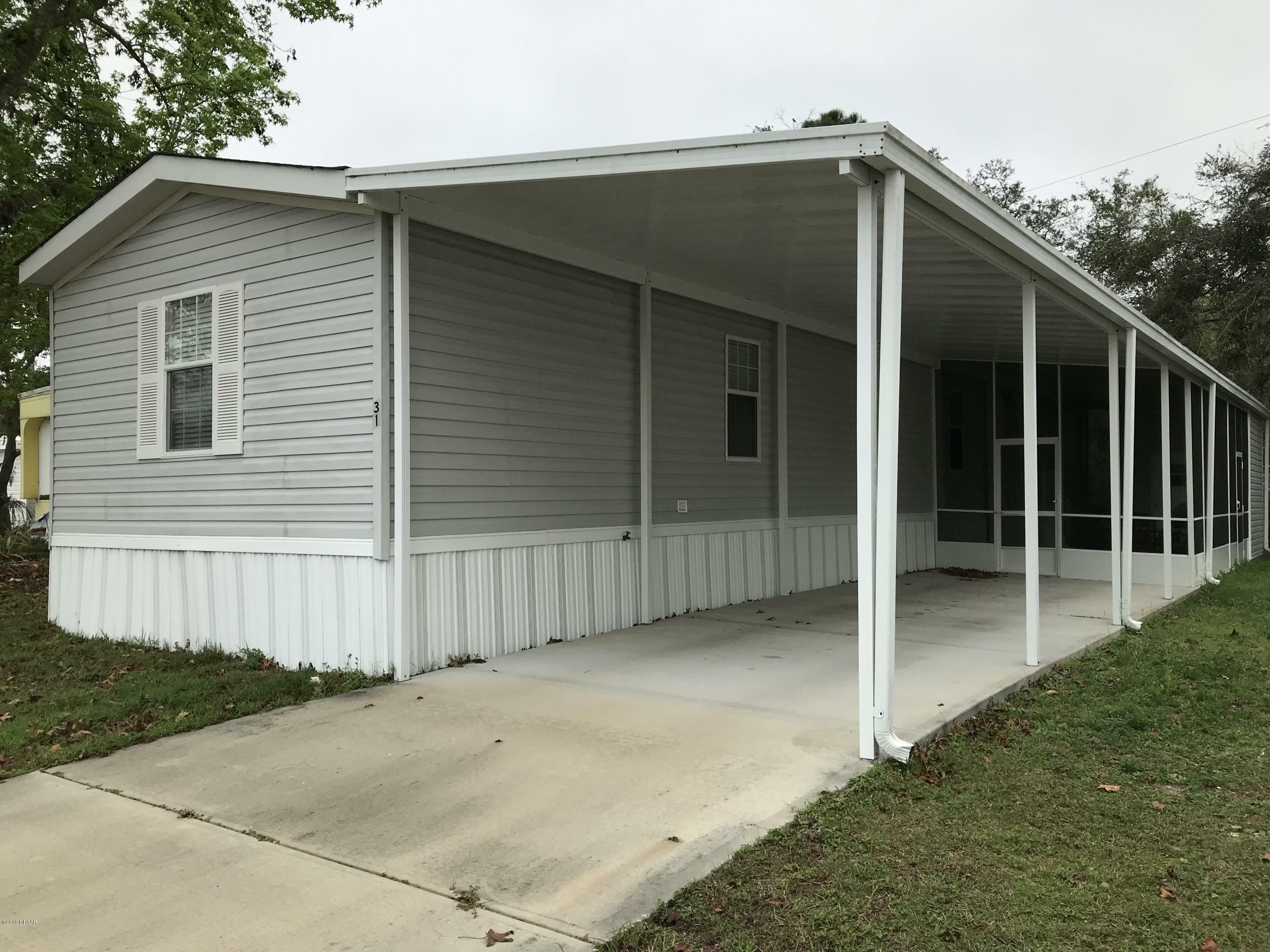 Property Photo:  2300 S Nova Road  FL 32119 