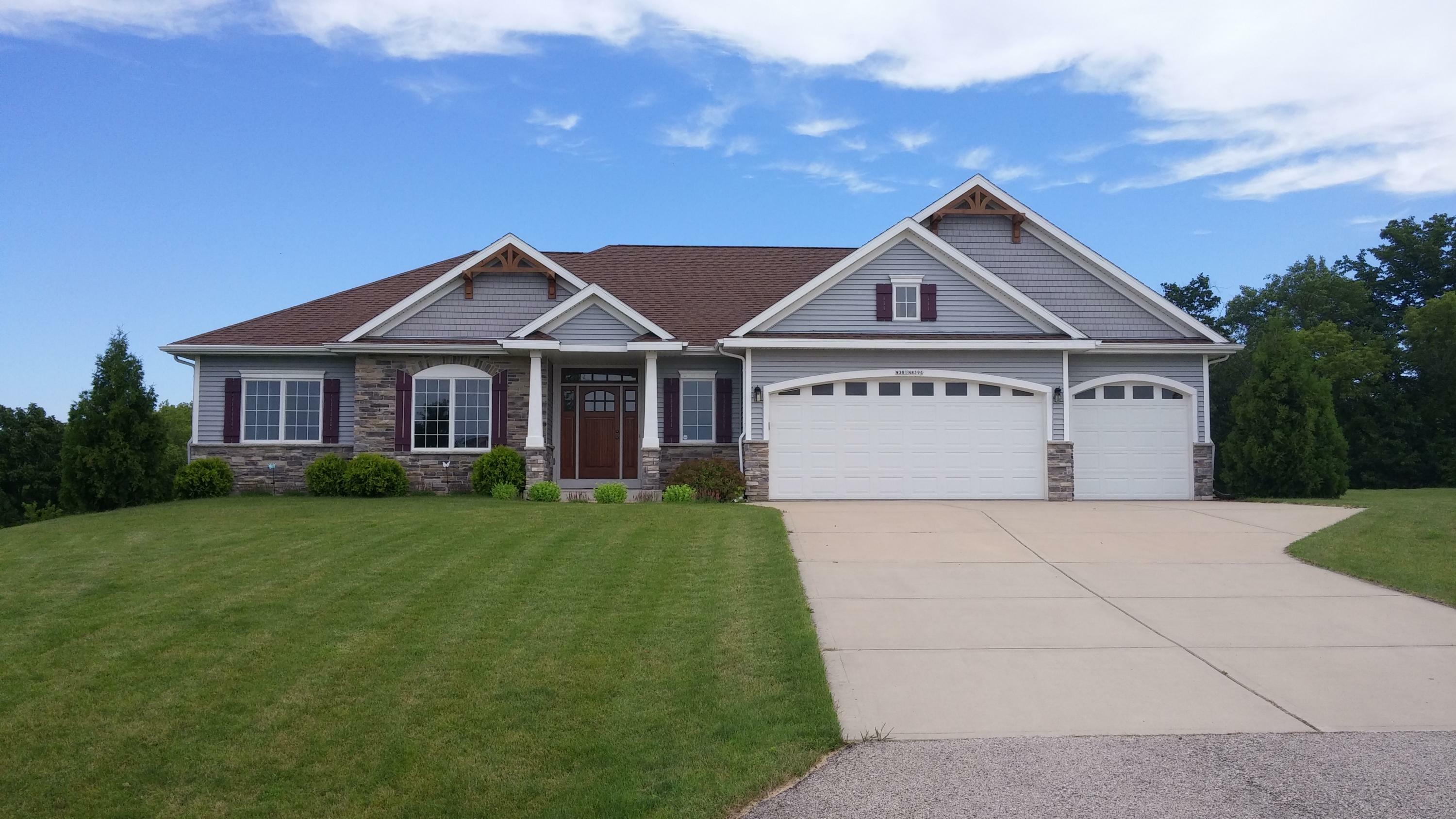 Property Photo:  W381n8394 Rolling River Ct  WI 53066 